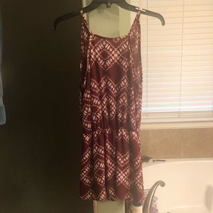 Maroon and white romper.